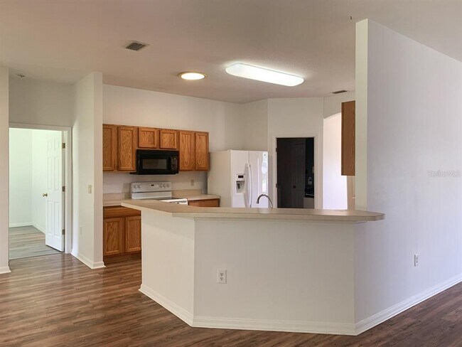 Building Photo - 9 Royal Palm Ln