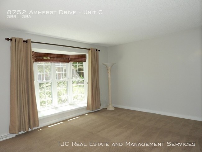 Building Photo - 8752 E Amherst Dr