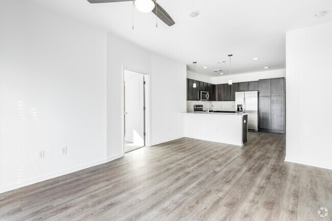 Steele Creek Apartments 2BR, 2BA - Living room and kitchen - The Exchange at Steele Creek