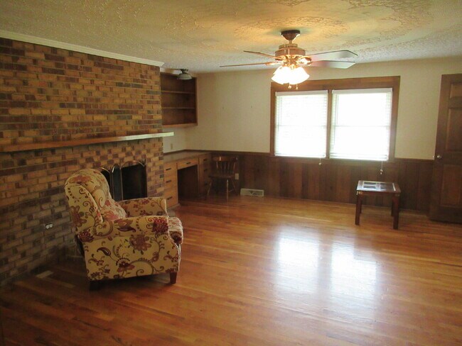 Building Photo - Charming All-Brick Ranch with Finished Bas...