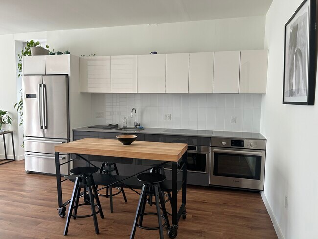 Kitchen area with modern appliances - 57 N St NW