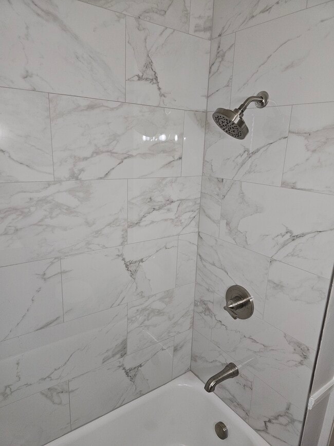 Marble shower - 131 E Park Ave