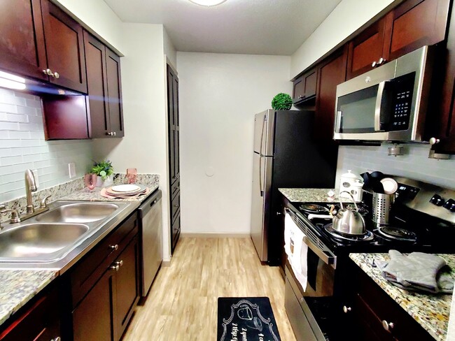 Renovated kitchen - The Oaks Apartments