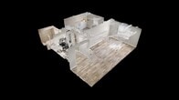 Located at 3103 Churchill Place in Louisville, Kentucky, this one-bedroom, one-bathroom unit offers a well-organized single-floor layout designed to maximize functionality. Light-toned wood-style flooring runs throughout the main living areas, contributing to a bright, cohesive aesthetic complemented by neutral gray walls and white trim.

The living room provides an open, versatile space with a textured ceiling and a window fitted with blinds that allows natural light to filter in. An entry door opens directly into this area, making the layout feel accessible and straightforward.

The kitchen is well-appointed with white shaker-style cabinetry, stainless steel appliances including a range, over-the-range microwave, and dishwasher, along with a stainless steel sink. A notable feature is the dedicated in-unit laundry area adjacent to the kitchen, housing a full-size washer and dryer.

The bedroom features carpeted flooring, a window with blinds for natural light, and two separate closets with shelving, offering practical storage. A hallway connects the bedroom to the bathroom, which includes a full soaking tub and shower combination with floor-to-ceiling beige tile surround, wood-style flooring, and clean white fixtures throughout.