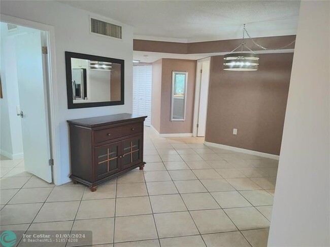 Building Photo - 9070 Lime Bay Blvd