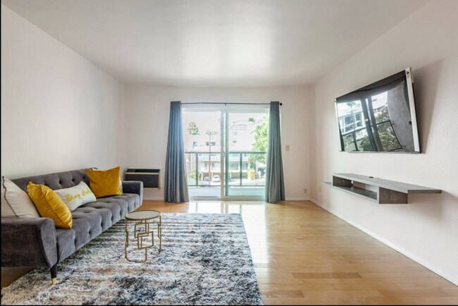 Living room and large outdoor balcony - 9005 Cynthia St