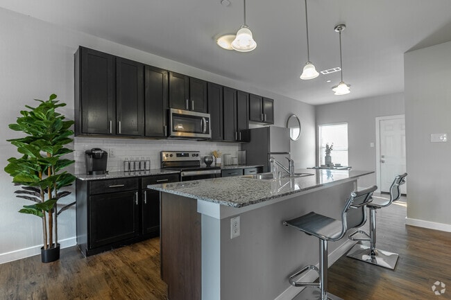 4BR, 2.5BA - 1,897SF - Kitchen - Townhomes at Bluebonnet Trails