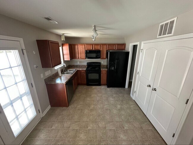 Building Photo - Spacious 3-Bedroom Home with Garage
