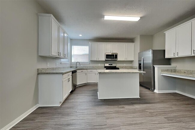 Foto del edificio - 6606 Rustling Timbers Ln