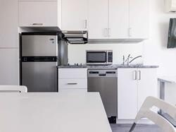 Photo du bâtiment - SLEEK FURNISHED STUDIO APARTMENT FOR RENT ...