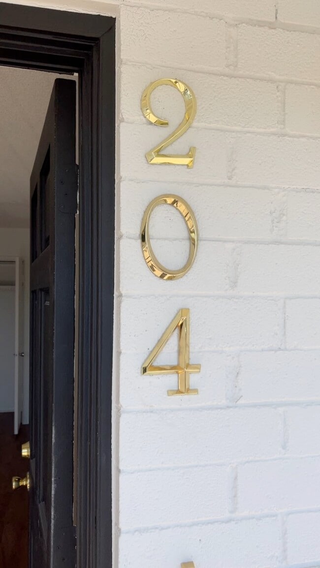 Beautiful Brick Entrance Way and Gold Numbers - 301 W Helen St