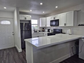 Building Photo - 6850 W 16th Dr