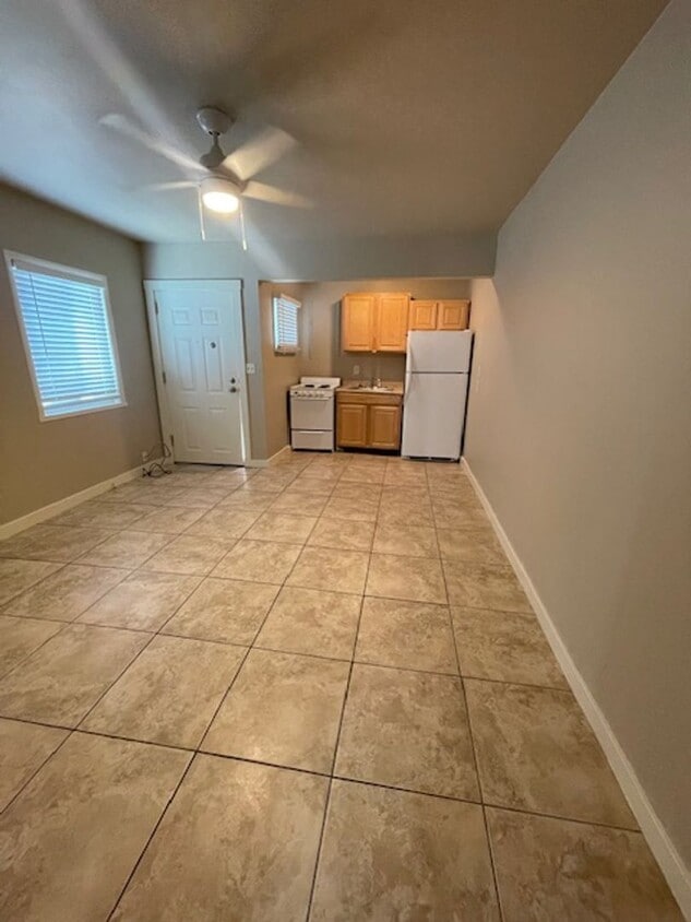 Primary Photo - Cozy triplex unit, located in the Heart of...