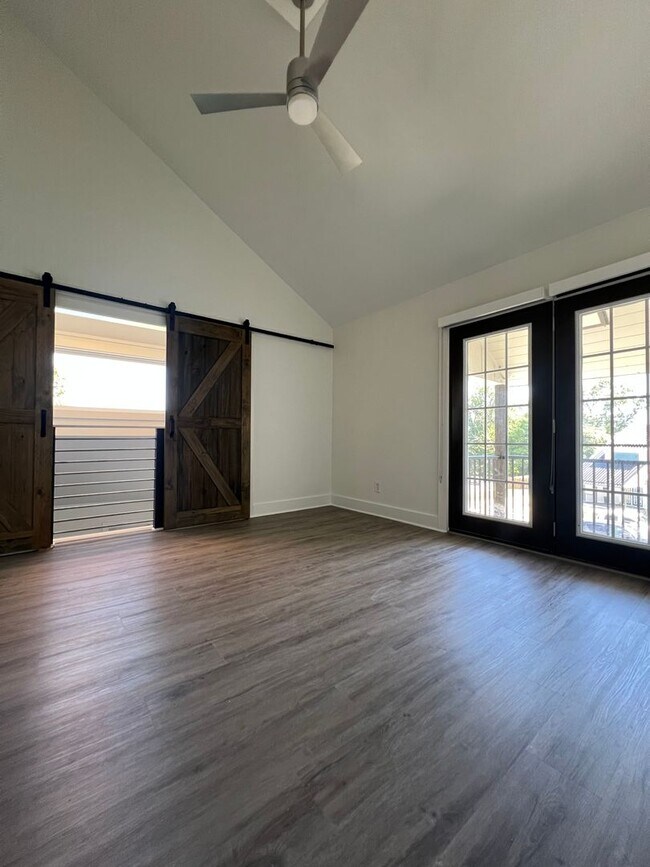 Building Photo - Lakefront Luxury Awaits: Modern 2BR with Private Dock & Pool