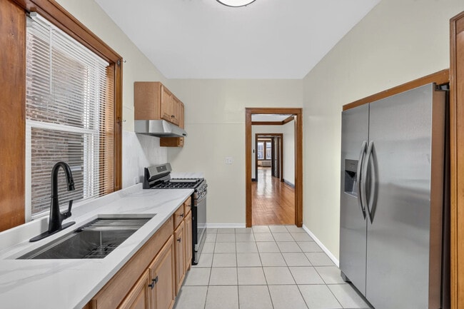 Foto del edificio - 7324 S Maplewood Ave