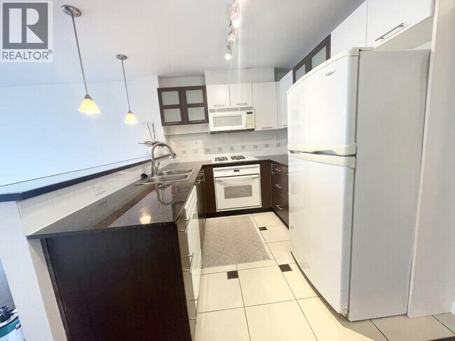 Photo du bâtiment - 1608-7831 Westminster Hwy