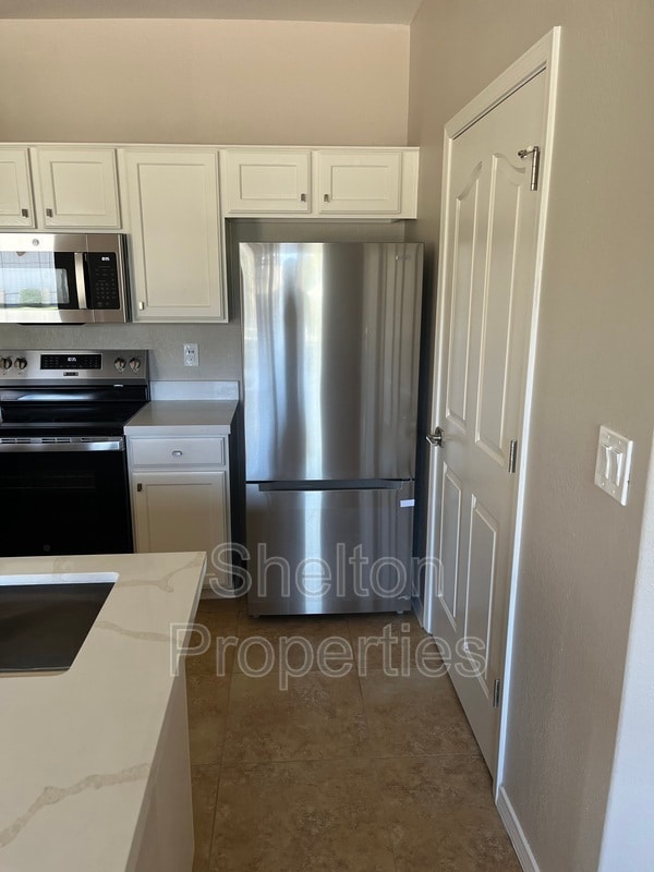 Photo - 6920 E 4th St Apartment