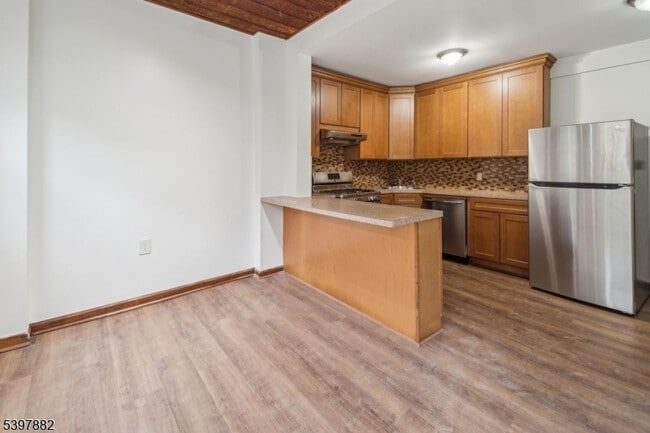 Building Photo - 310 Paterson Plank Rd