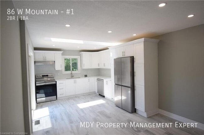 Building Photo - Welcome home to this warm and inviting upp...