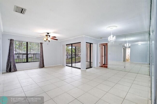 Building Photo - 3463 Cocoplum Cir