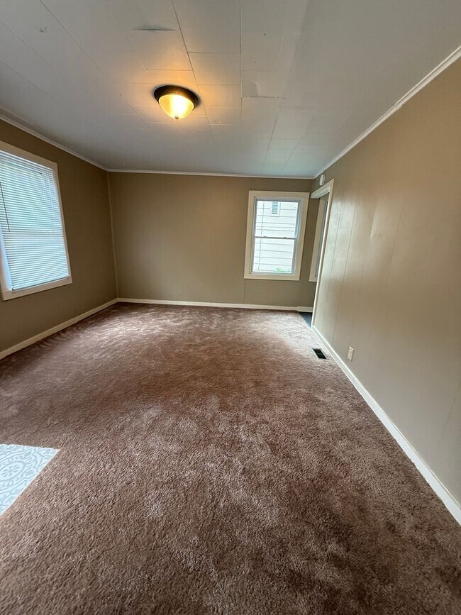 Foto del edificio - Charming 2-Bedroom Duplex in a Convenient ...