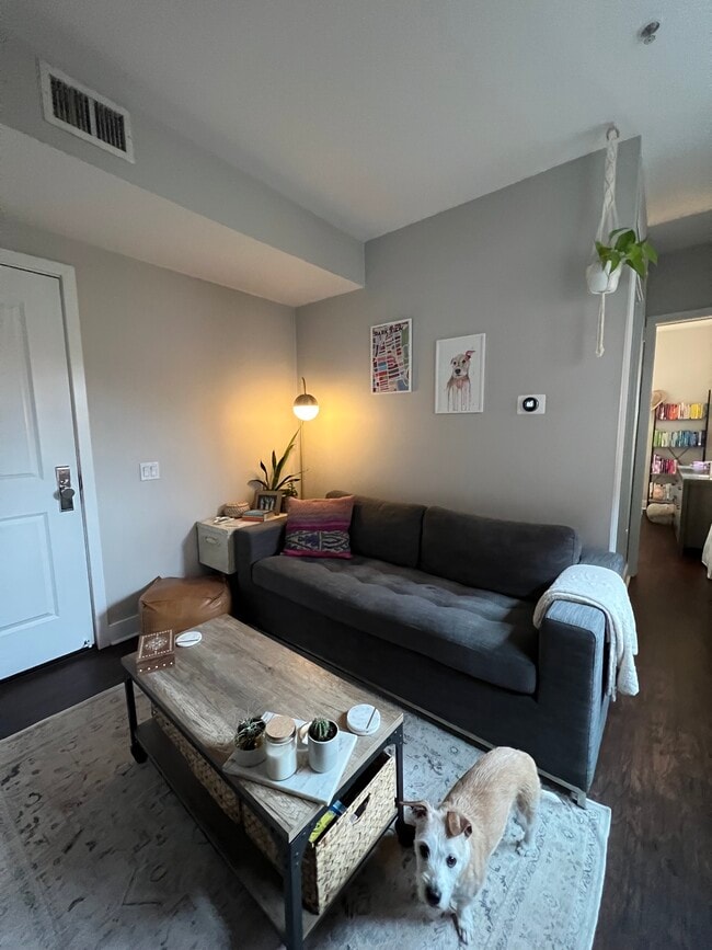 living room fits full size couch with side table and coffee table - 3606 Rock Creek Church Rd NW