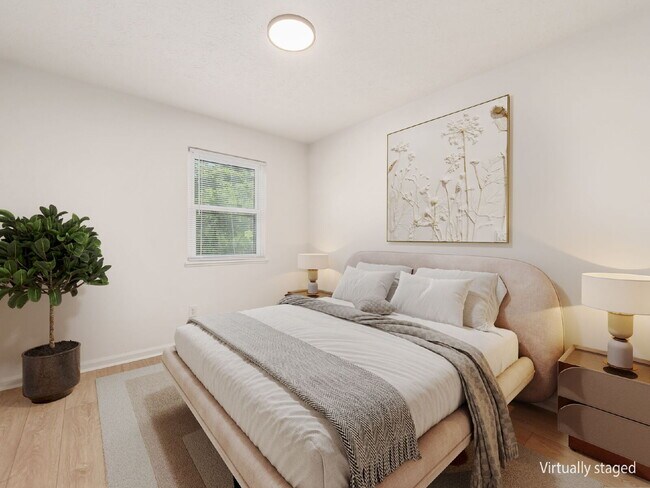 Building Photo - Half Month FREE — Updated 2BR w/ In-Unit Laundry, Central A/C + 2 Parking Spots | Touring starts ...