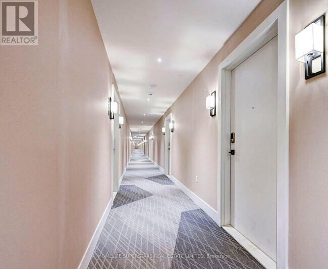 Photo du bâtiment - 415-415 Sea Ray Ave