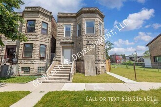 Building Photo - 6433 S Vernon Ave