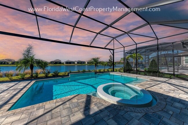 Building Photo - STUNNING 4 BEDROOM POOL HOME WITHIN THE LA...