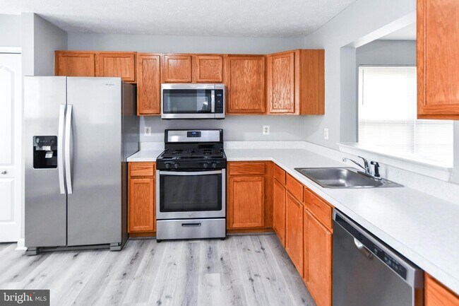 Foto del edificio - 9815 Berrywood Ct