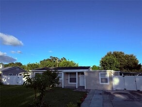 Building Photo - 7115 Orpine Dr N
