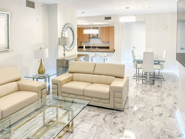 Building Photo - Experience Elevated Living at The American...