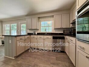 Building Photo - 6801 Woodland Cres
