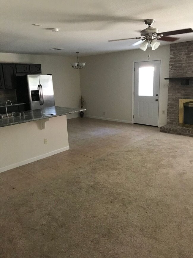 Building Photo - COMING SOON! 3 Bed / 2 Bath – Updated Home with Fireplace & Shaded Backyard