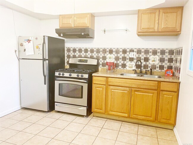 Foto del edificio - 104-33 Lefferts Blvd