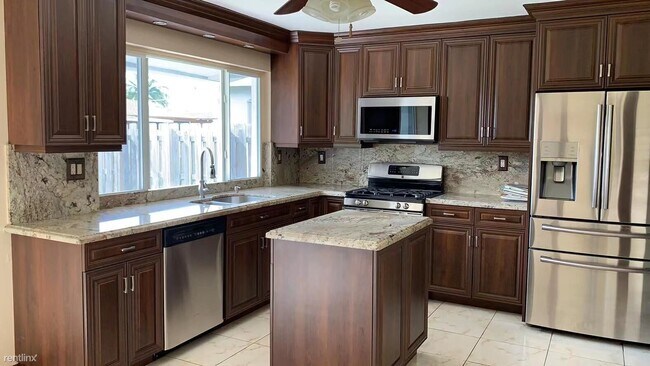 Foto del edificio - 4 br, 2 bath House - 8980 NW 24th St