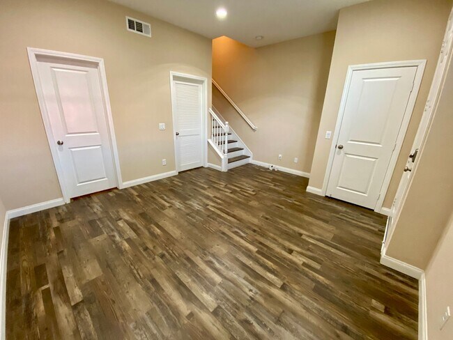Building Photo - Stylish 3-Story Townhome with Balconies & Open-Concept Living