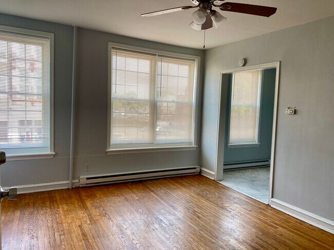 Livingroom area view of Main St. - 114 E Main St