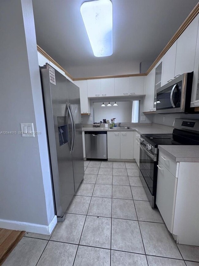 Photo - 1435 NW 154th Lane -, Pembroke Pines, FL 33028 - 1675 House