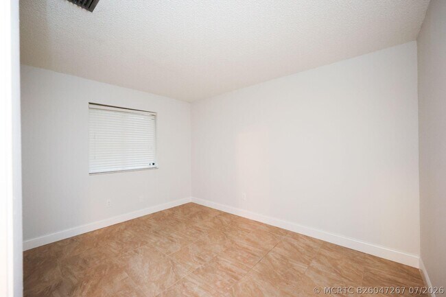 Building Photo - 10127 Boca Bend E