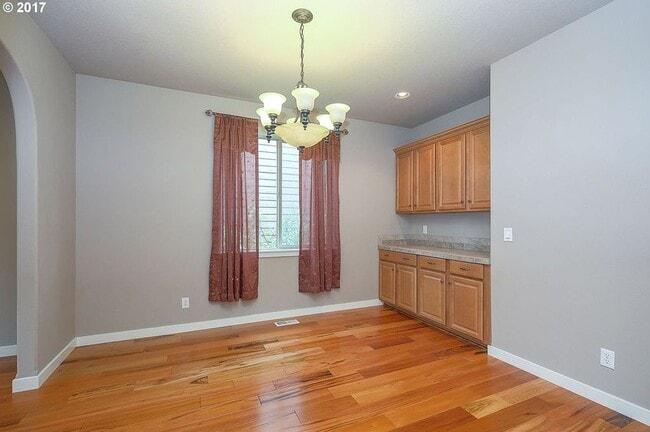 Building Photo - 6146 NE Ridgestone Ct
