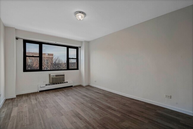 Building Photo - 83-60 118th St