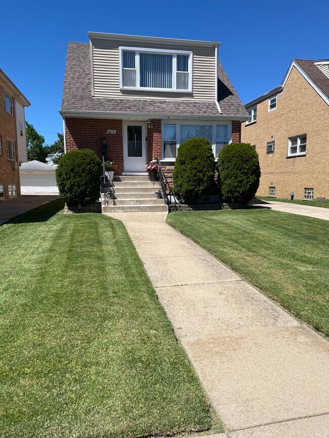 Foto del edificio - 6138 W Leland Ave