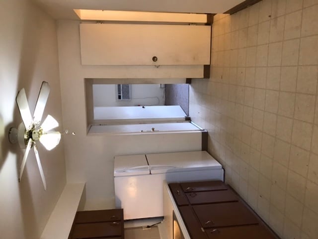 Looking through kitchen to bedroom - 2350 McCausland Ave