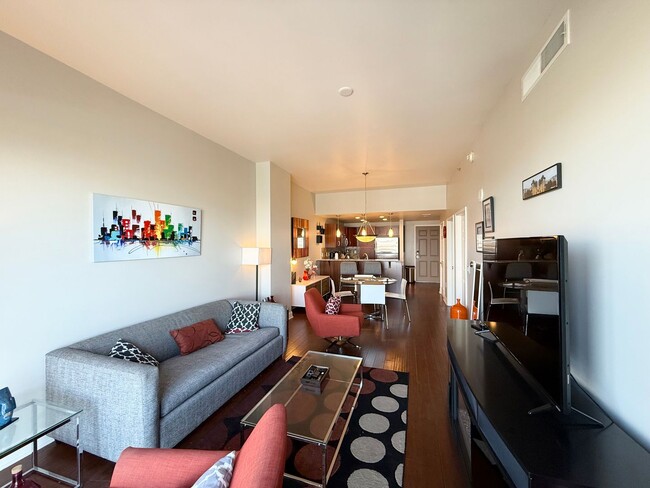 Building Photo - 1/BD 1.5/BA Luxury High-Rise Living with B...