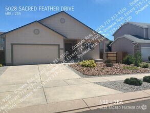 Building Photo - 5028 Sacred Feather Dr