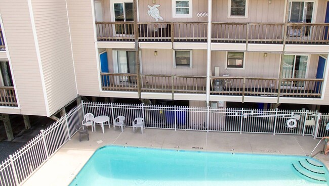 Balcony overlooking pool - 505 Carolina Beach Ave N