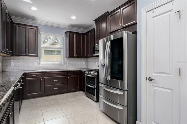 Building Photo - 10413 Highland Park Pl