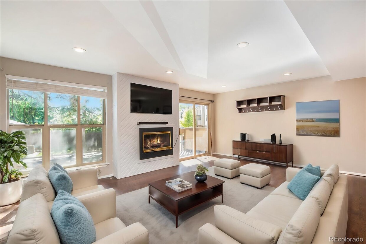 Living room with tons of space and natural light. - 701 Harlan St